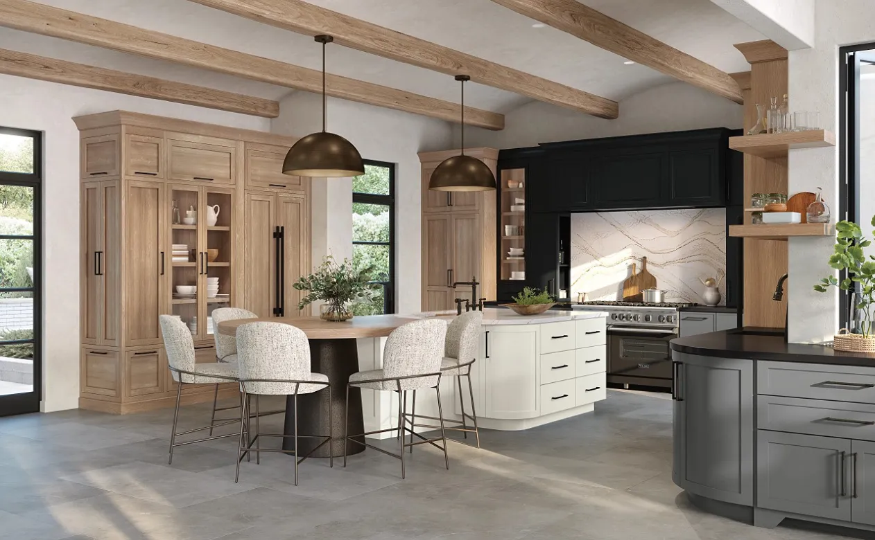 Kitchen with gray tile floors and natural, black, and white cabinetry
