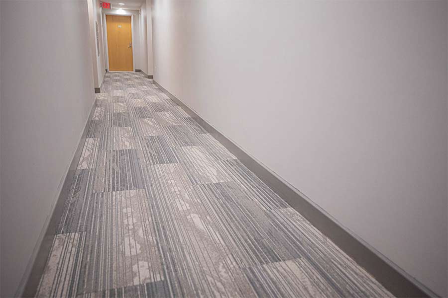 gray commercial carpet in hallway
